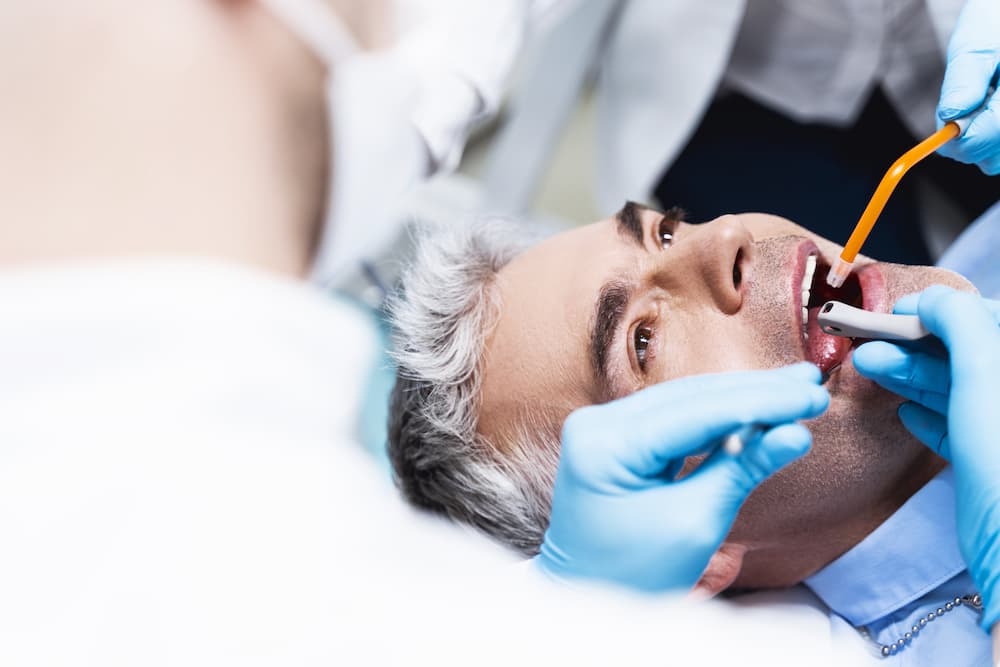 man-having-root-canal-put-stock-photo-79G22W4 (1)