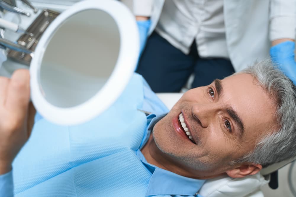 happy man after dental procedures stock photo 2021 09 03 15 38 22 utc 1